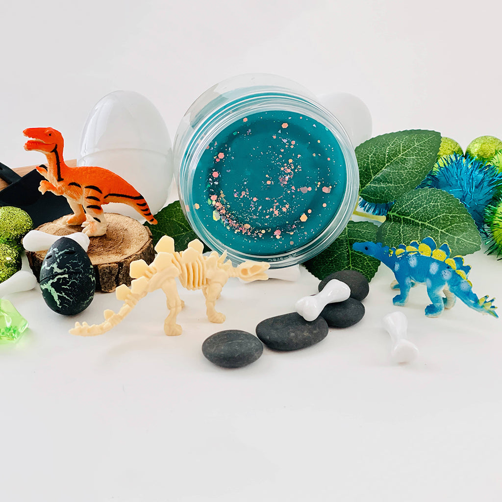 blue sensory play dough from dinosaur themed play kit