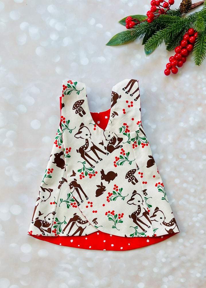 deer print holiday dress for baby and toddler girls back view