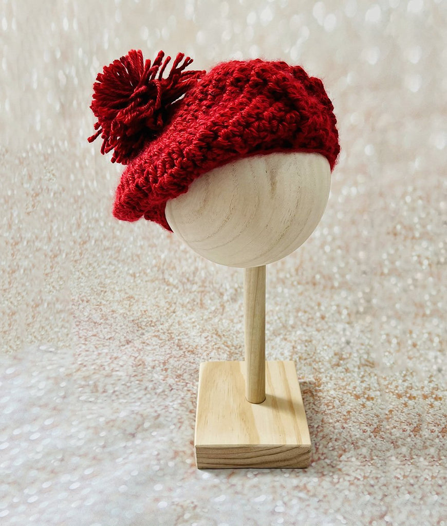 Dark red crocheted beret style baby pom pom hat 
