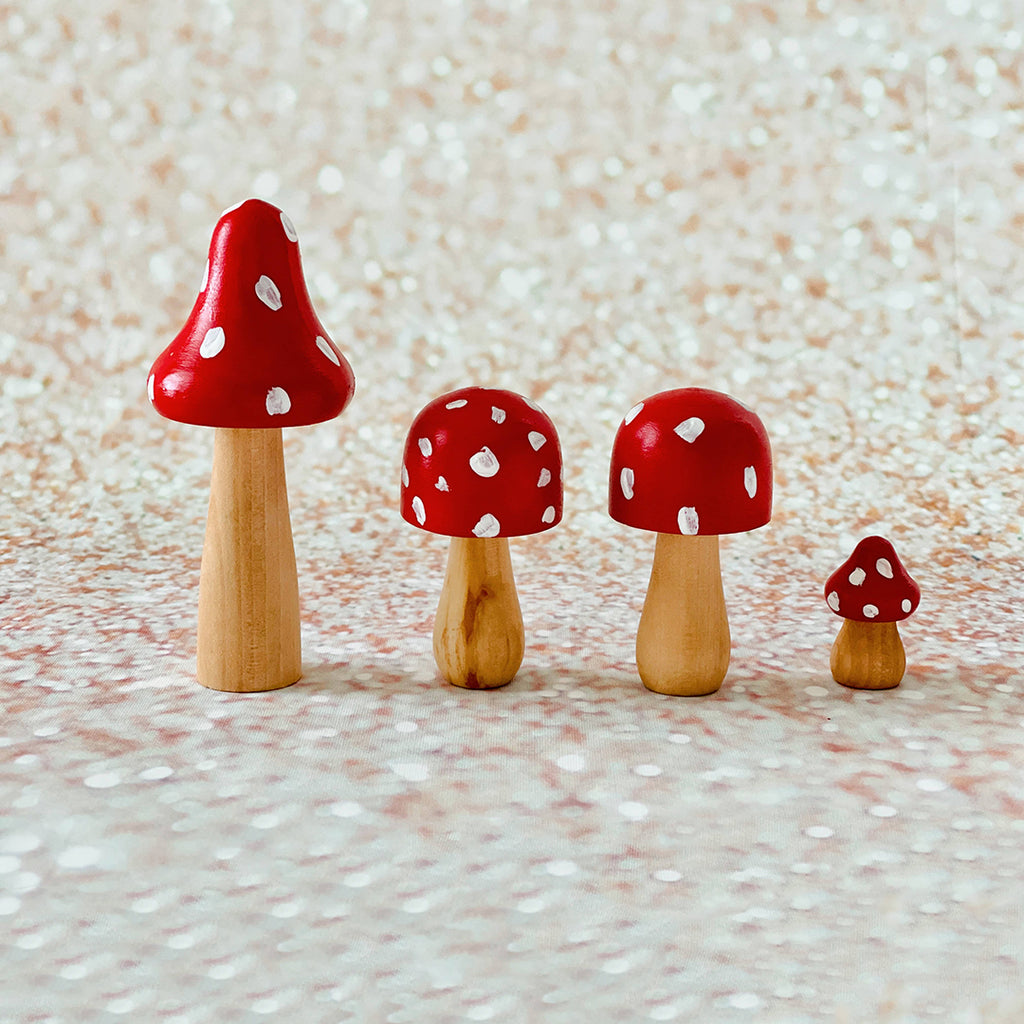 red painted wooden mushrooms open ended play