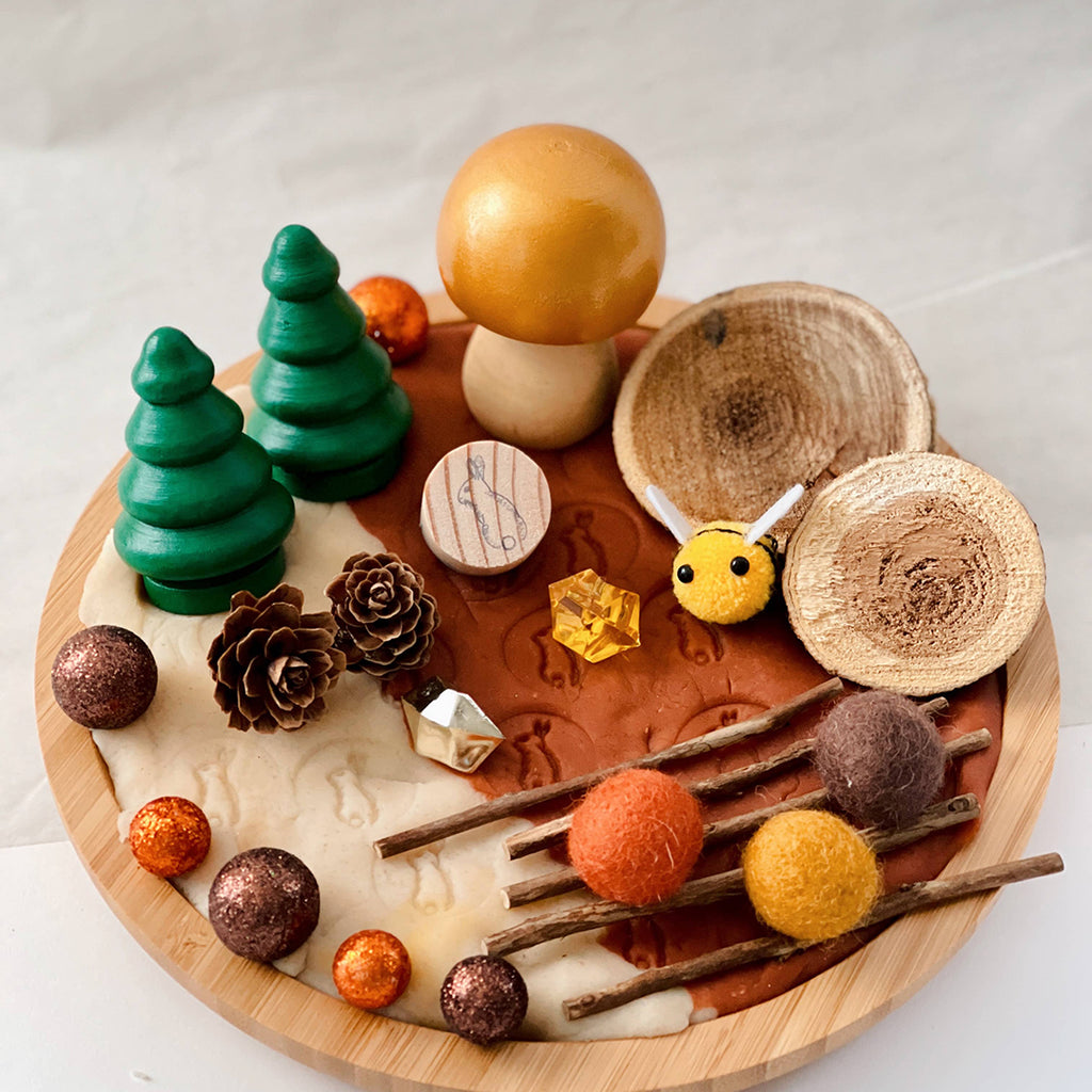 wooden tree toys used in a kids sensory playdough set