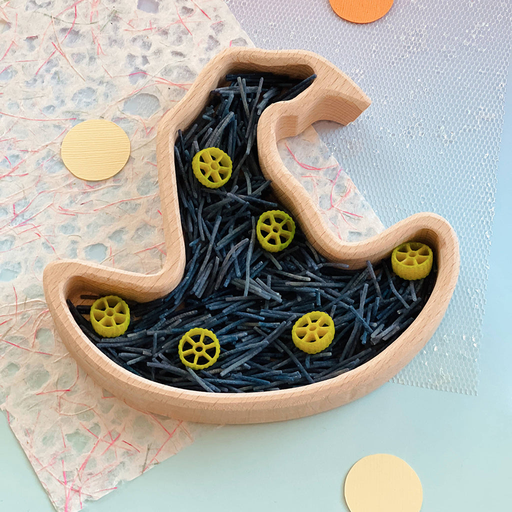 wooden witch hat shaped Montessori sensory bin for open ended play