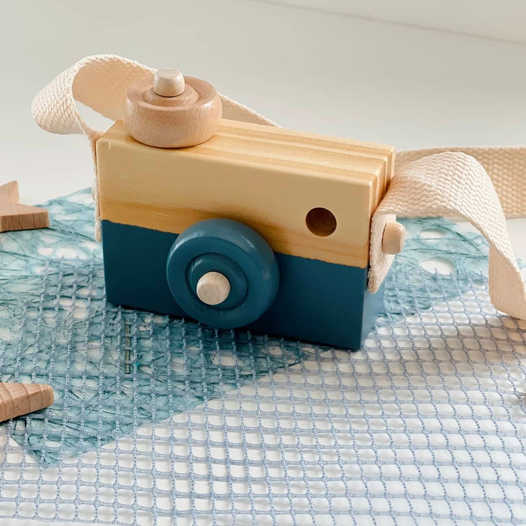 dark blue wooden camera toy pretend play nursery decor
