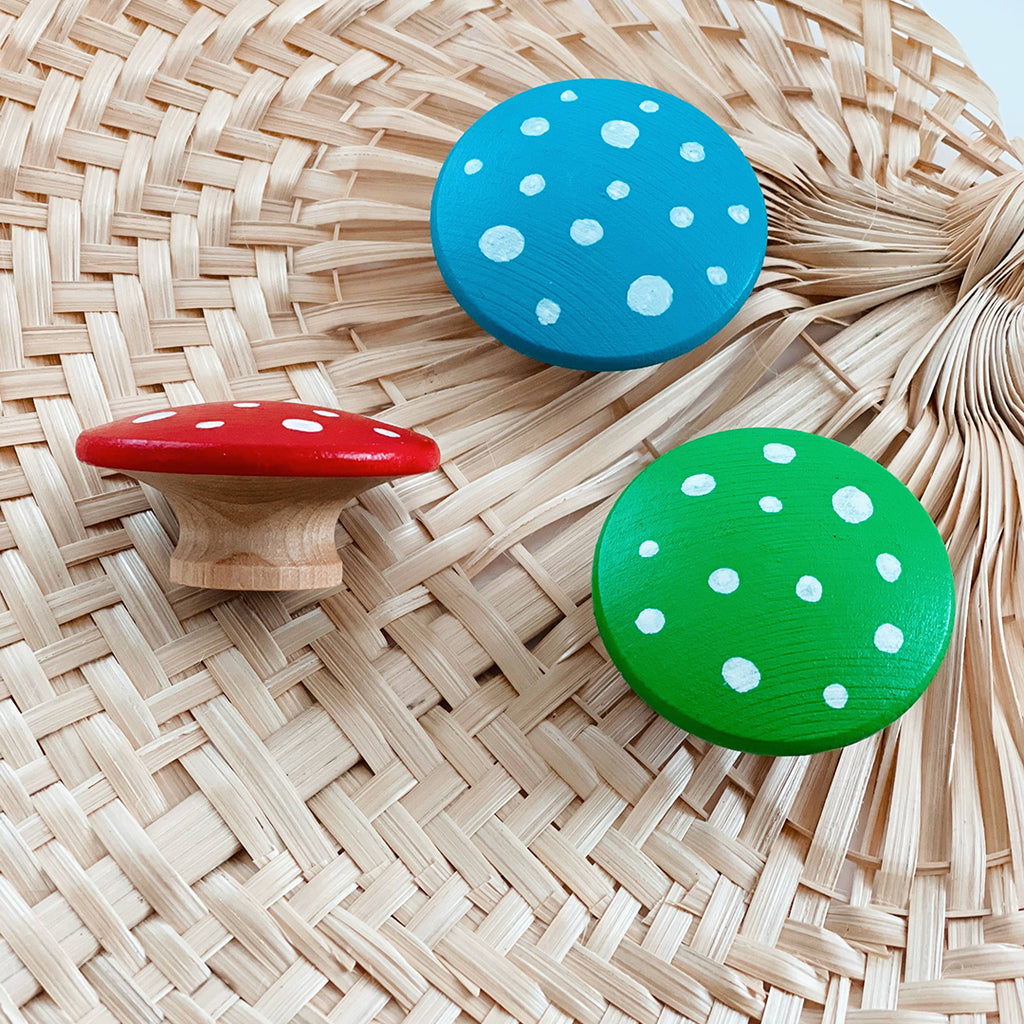 three spotted wooden mushroom toys for kids