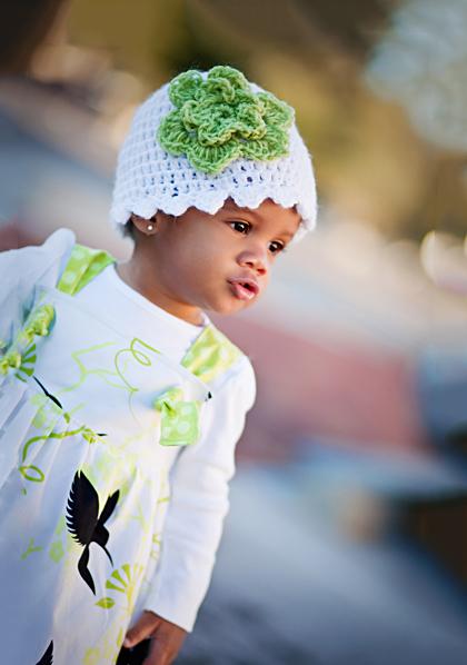 toddler wearing a white crochet hat for baby girls