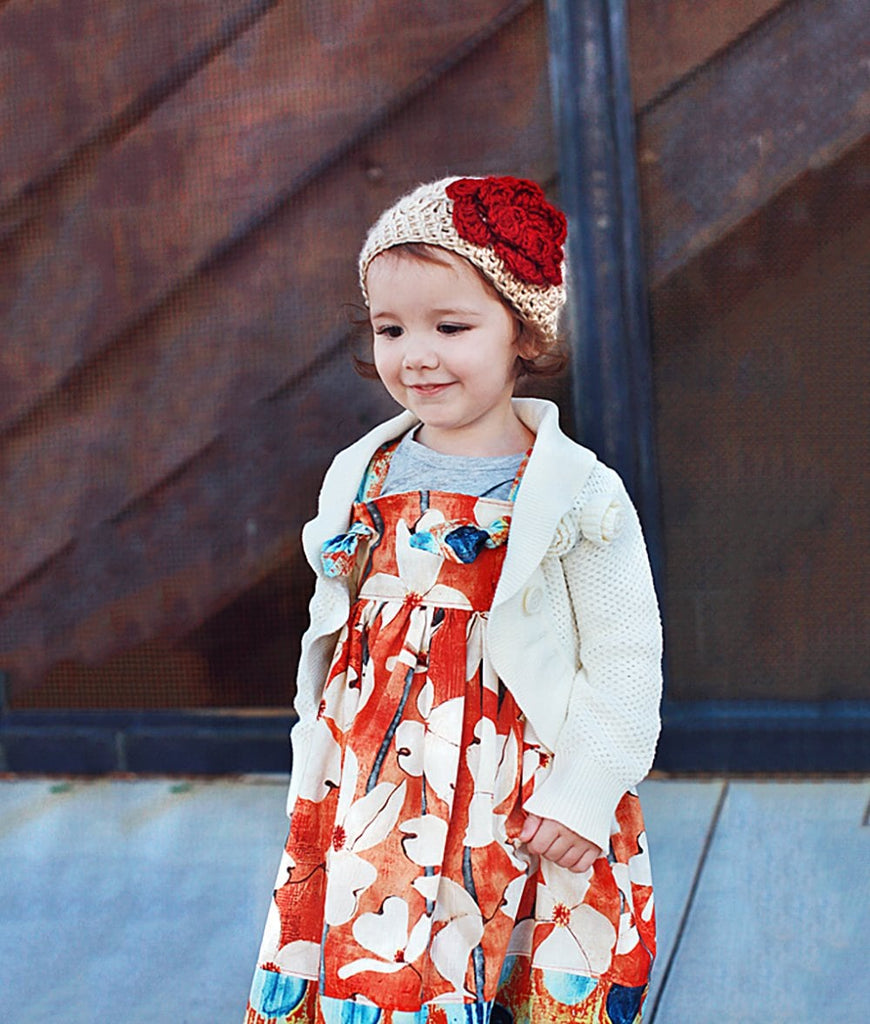 beige crochet baby girl beanie hat with dark red flower accent