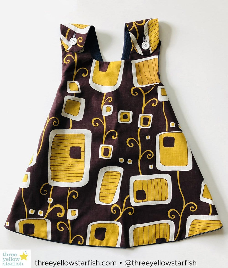brown and gold little girl dress