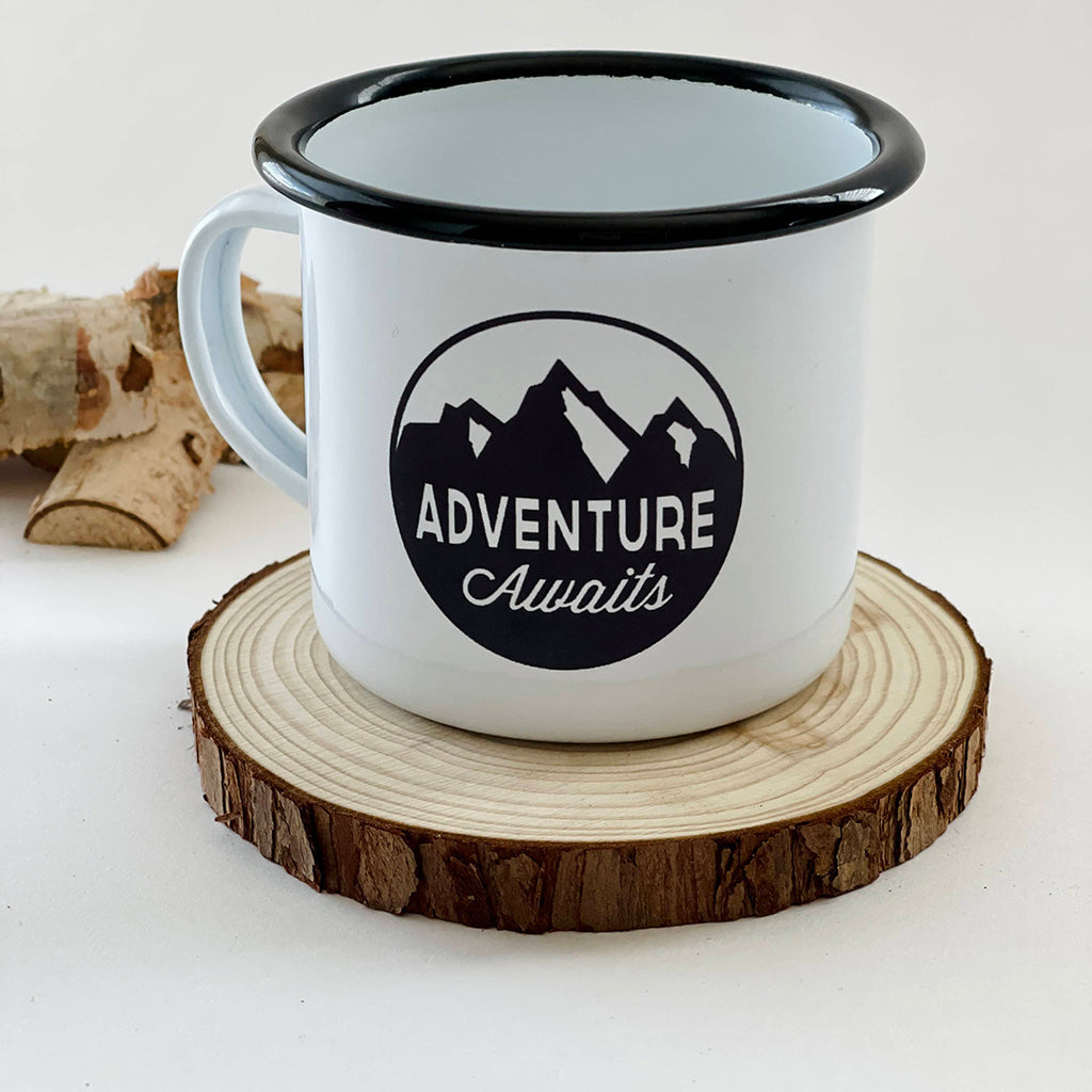 adventure themed camping enamel mug in black and white