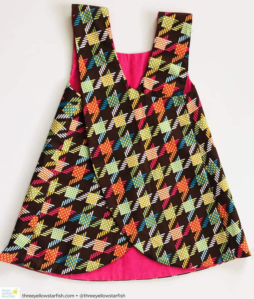 little girl party dress in brown and pink houndstooth print fabric