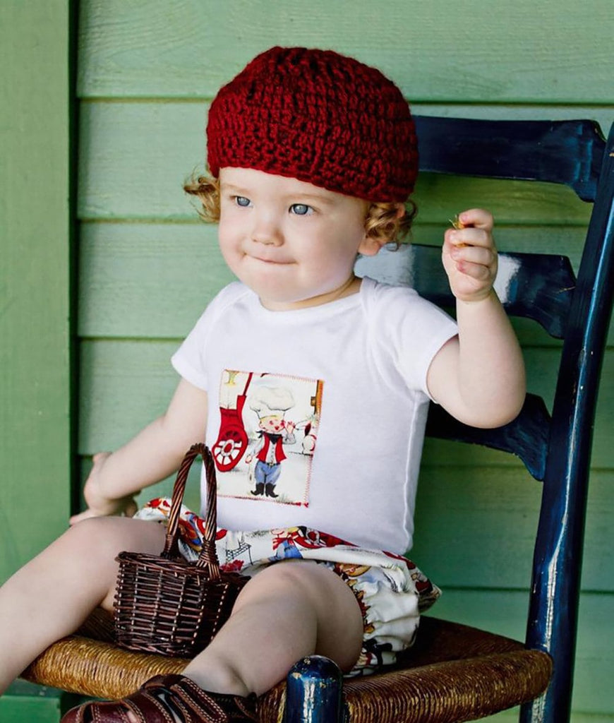boy wearing vintage cowboy themed baby newborn gift set