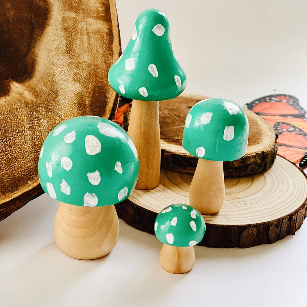 teal hand painted wooden mushrooms