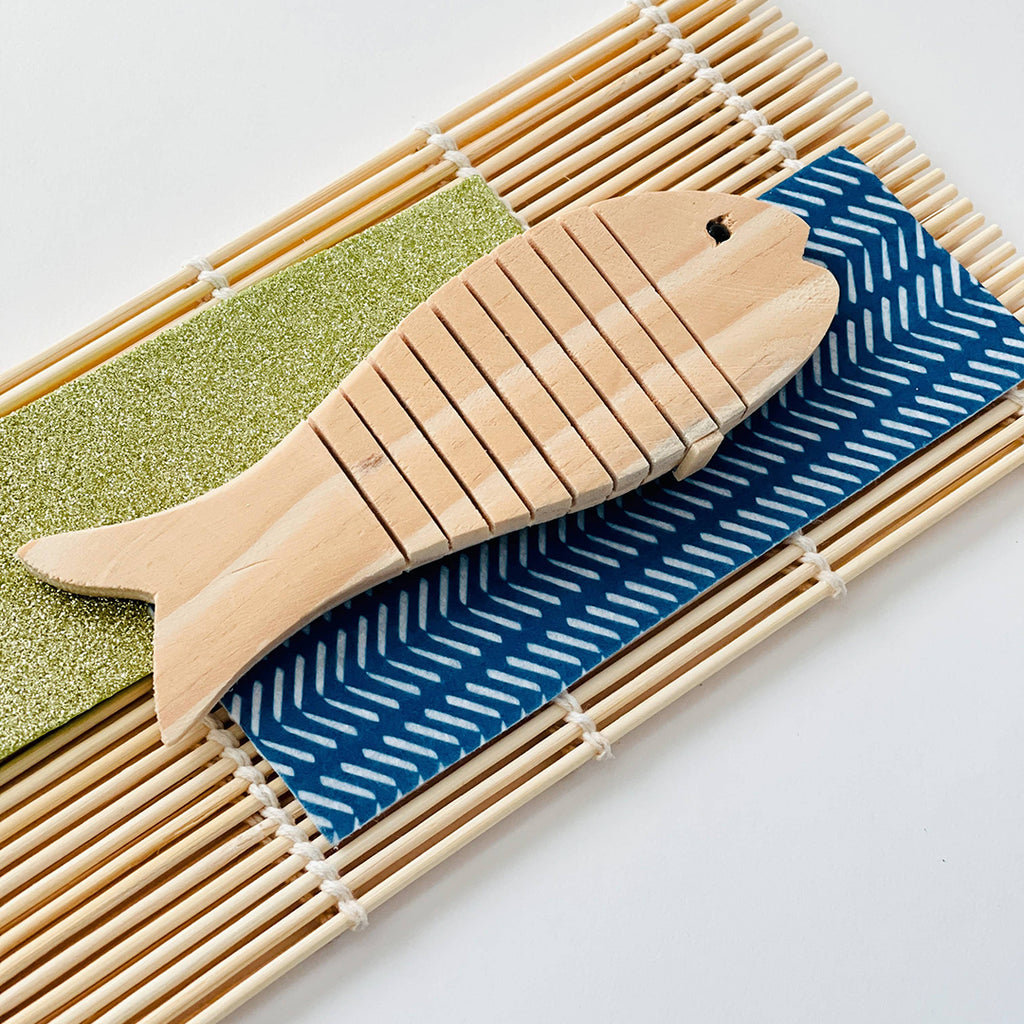 wooden bendable interactive fish from kids sushi themed sensory playdough kit