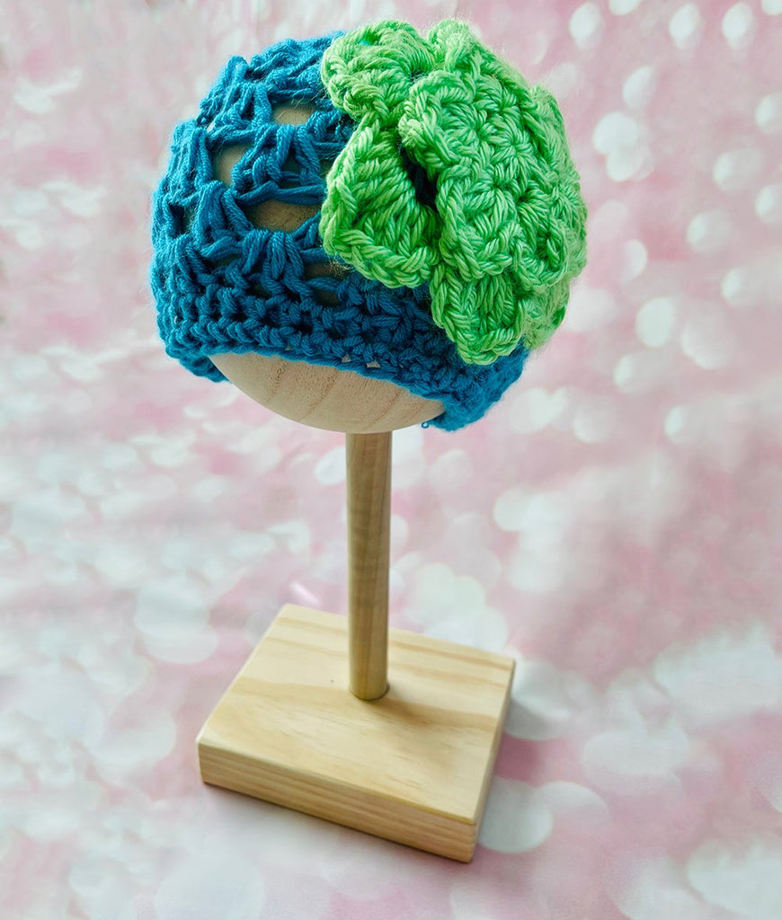 turquoise crochet baby girl beanie hat with lime green flower accent