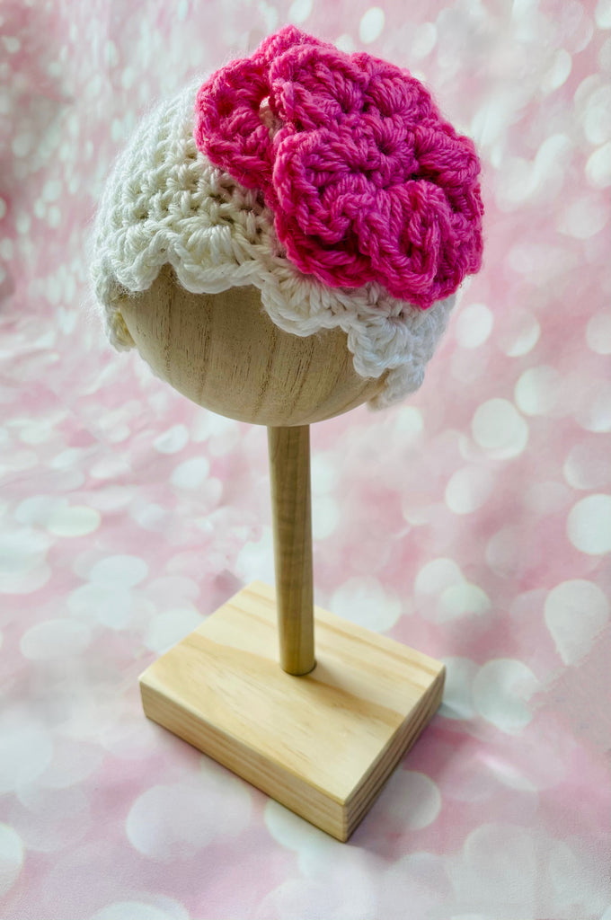 baby girls white crochet hat with pink flower accent