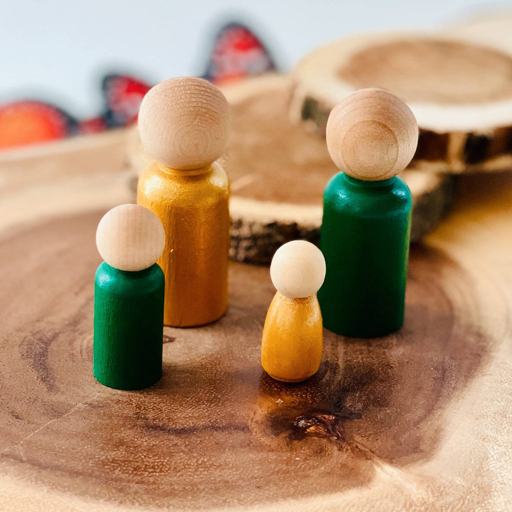 set of four gold and green wood peg dolls for kids